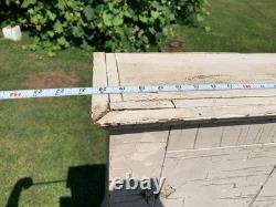 Wooden wall-hanging cabinet heavily crackled, chippy off-white paint antique