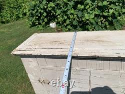 Wooden wall-hanging cabinet heavily crackled, chippy off-white paint antique