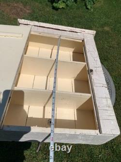 Wooden wall-hanging cabinet heavily crackled, chippy off-white paint antique